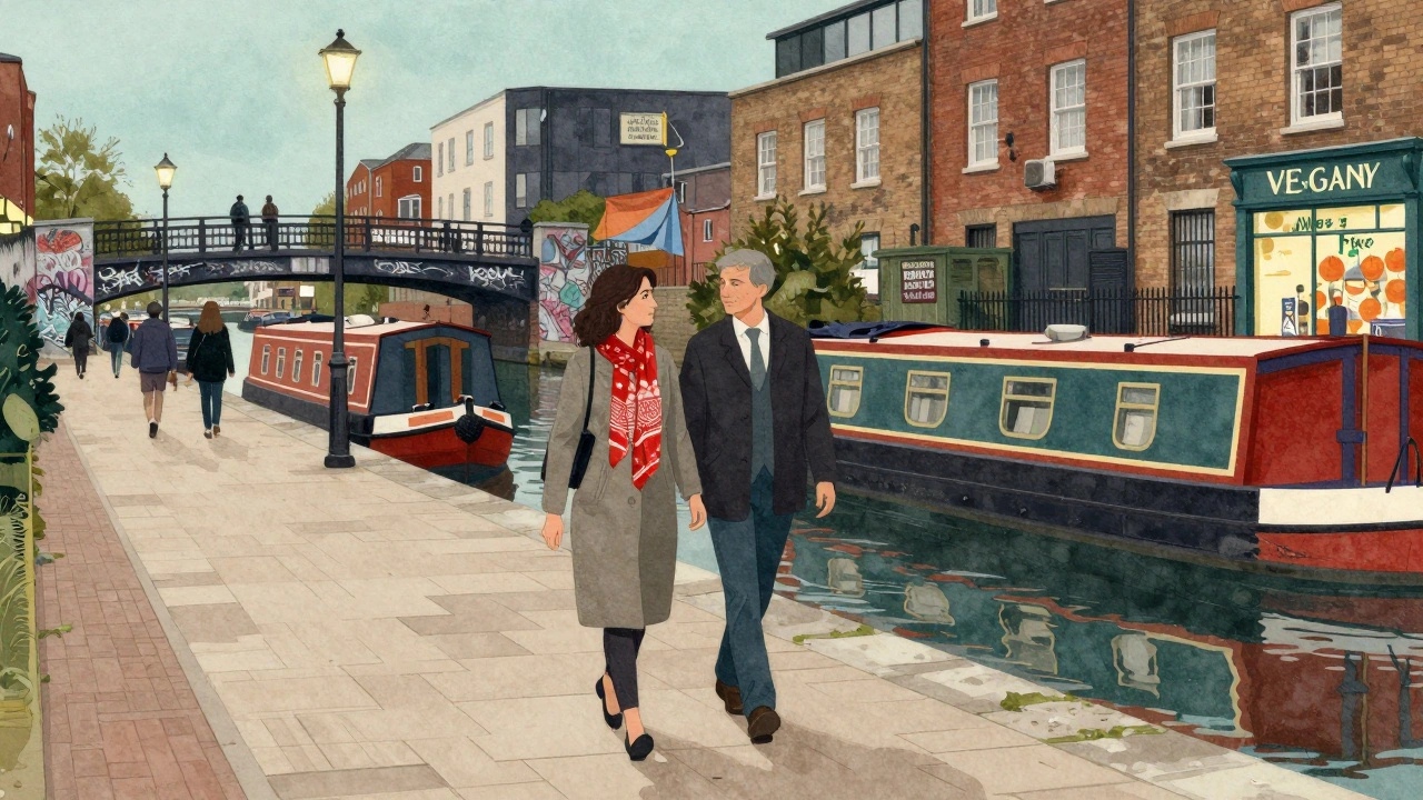A woman walks beside a client along Regent&#039;s Canal at dusk, cultural details subtly visible.