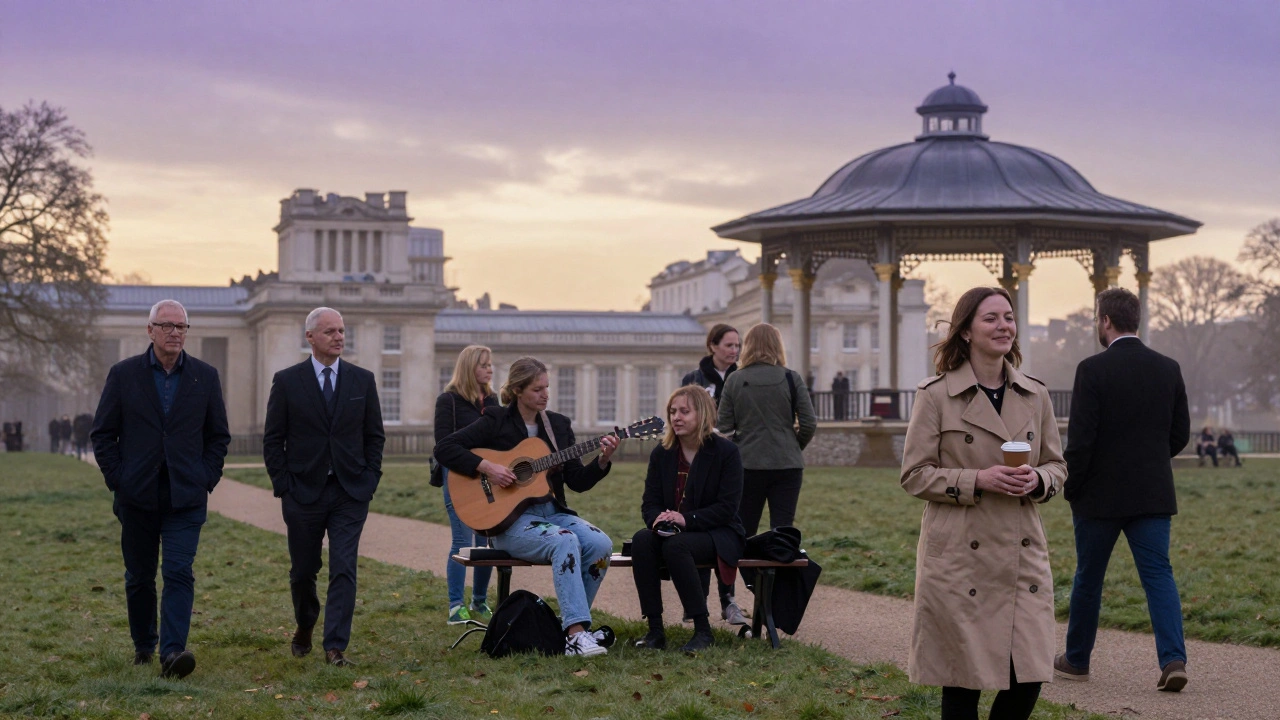 People relaxing on benches at Greenwich Park at dusk, listening to live music as fog rolls over the grass.