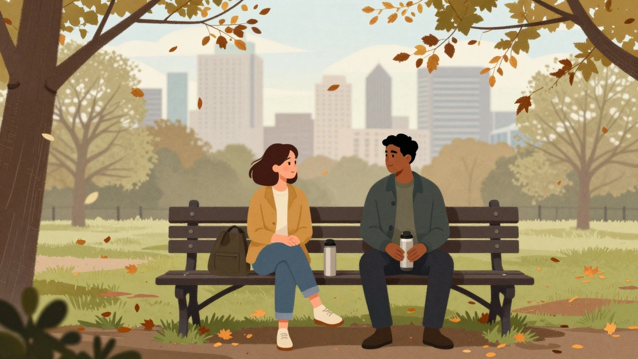 Two people sitting silently on a bench in Victoria Park, autumn leaves falling around them, sharing quiet companionship.