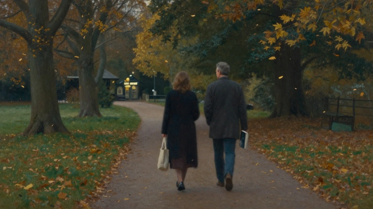 Two people walking peacefully together in an autumn park, sharing a quiet evening.