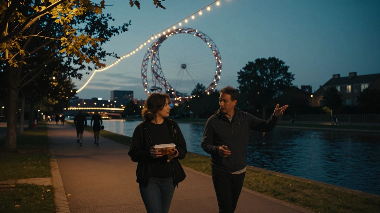 A couple walking along the canal path at dusk, with the ArcelorMittal Orbit glowing in the background.