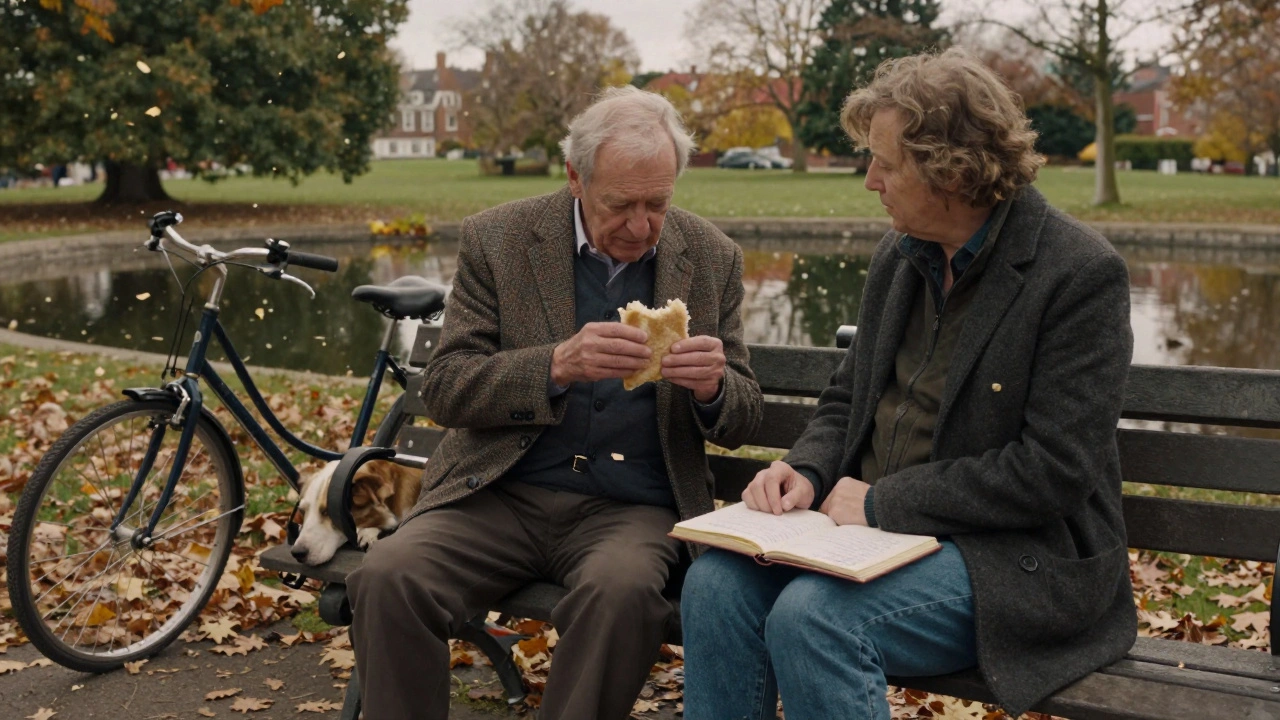 An older man and companion sitting peacefully on a bench in Victoria Park, sharing a sandwich.